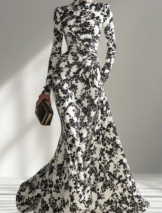 Black and white color-blocked printed long-sleeve maxi dress with pockets, slim fit, pleated design by Christine Brewer.