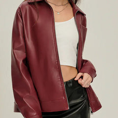 Bianca zip-up faux leather jacket for women by Christine Brewer, shown in black with silver zipper and fitted style.