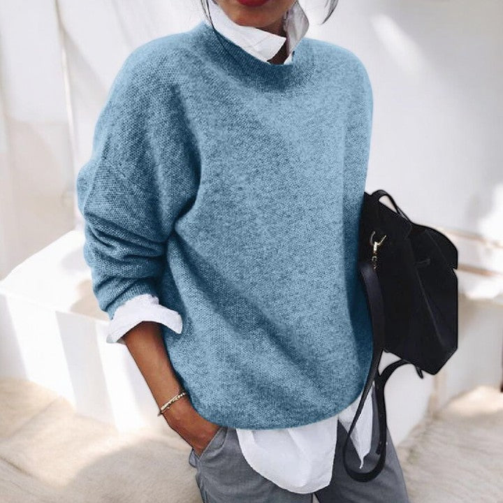 Blue knit sweater for women from Christine Brewer's Yvonne collection, featuring a cozy, stylish design.