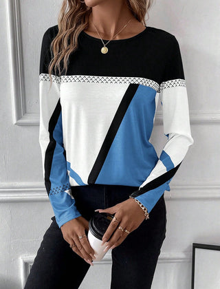 Blue Christine Brewer Quinn women's blouse with long sleeves and a relaxed fit, stylish chemisier for casual or office wear.