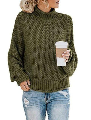 Christine Brewer Stella cozy turtleneck sweater in army green, featuring a loose fit and stylish knit design.