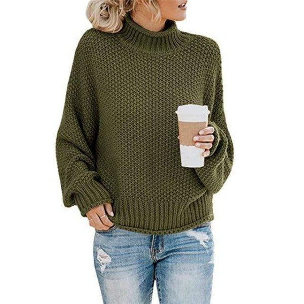 Christine Brewer Stella cozy turtleneck sweater in army green, featuring a loose fit and stylish knit design.