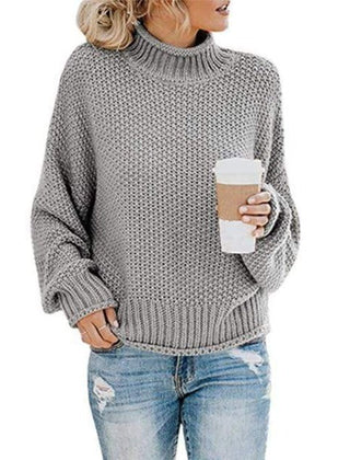 Gray turtleneck sweater for women by Christine Brewer, featuring a loose knit boho style, perfect for casual and cozy wear.