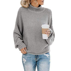Gray Stella Chic Cozy Turtleneck Sweater by Christine Brewer, featuring a loose fit and boho beach hut-inspired knit design.