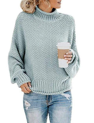 Light blue Christine Brewer Lola women's turtleneck sweater with a loose fit, featuring a cozy knit design and boho beach hut style.