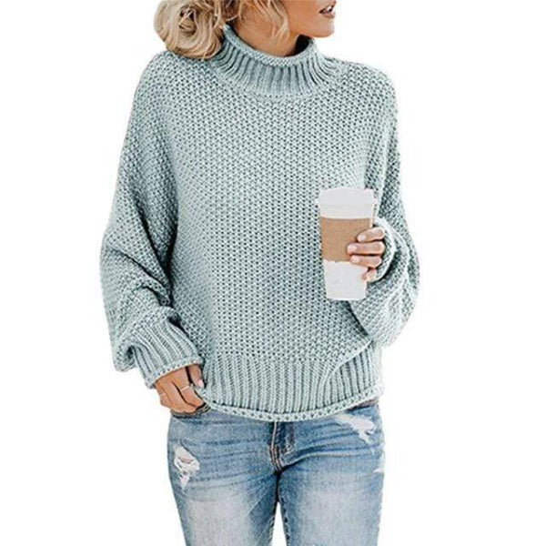 Light blue Christine Brewer Lola women's turtleneck sweater with a loose fit, featuring a cozy knit design and boho beach hut style.