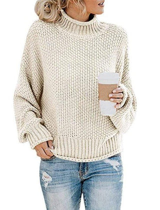 Off-white Christine Brewer Lola turtleneck sweater for women, loose fit with cozy knit texture, suitable for casual boho style.