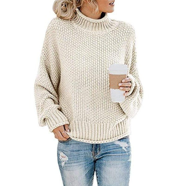 Off-white Christine Brewer Lola turtleneck sweater for women, loose fit with cozy knit texture, suitable for casual boho style.