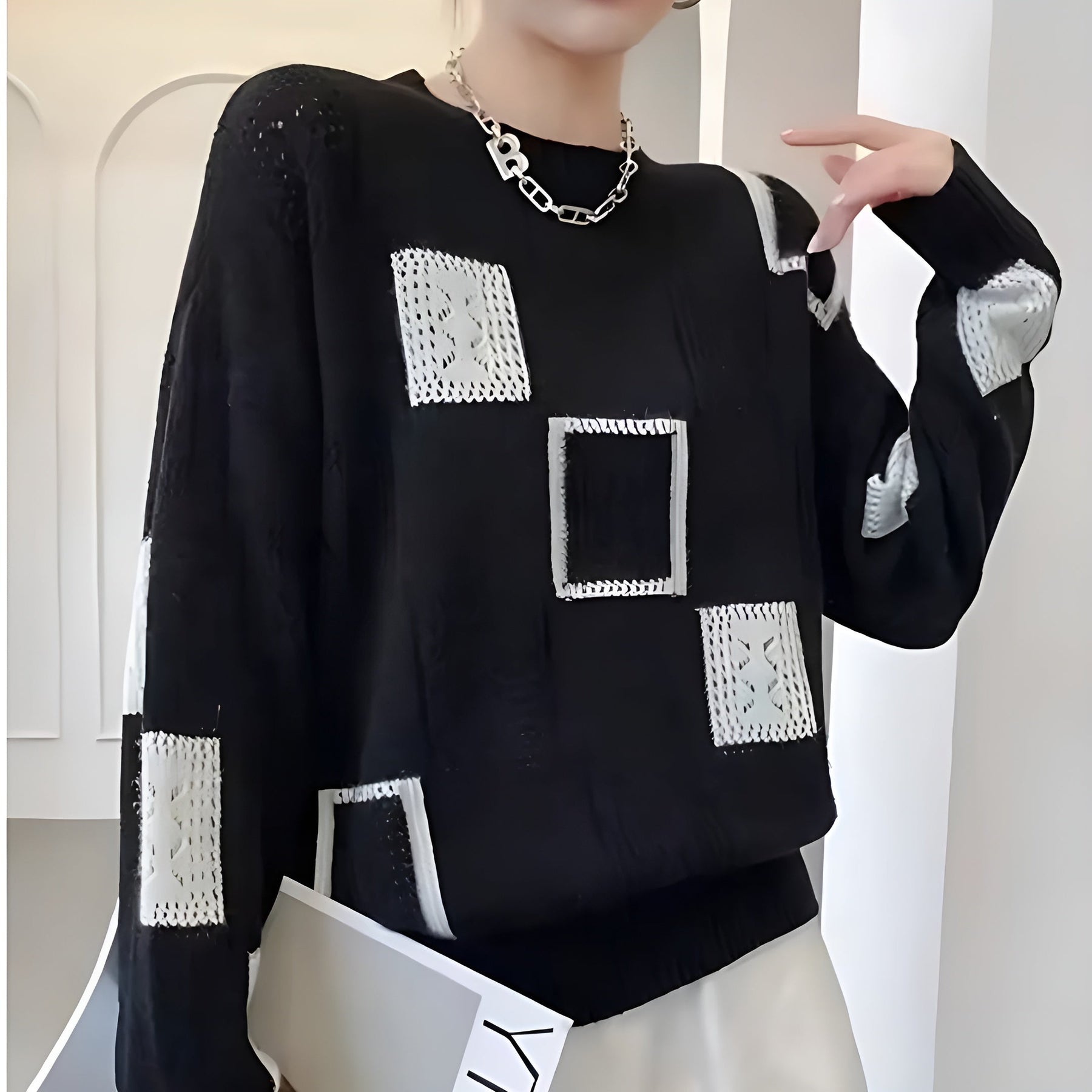 Emmeline knit sweater for women by Christine Brewer, soft gray sweater with a cozy, textured knit pattern.