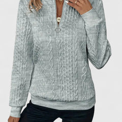 Women’s knit sweater by Christine Brewer, named Natalie, featuring a cozy, textured knit design and a classic fit in neutral tones.