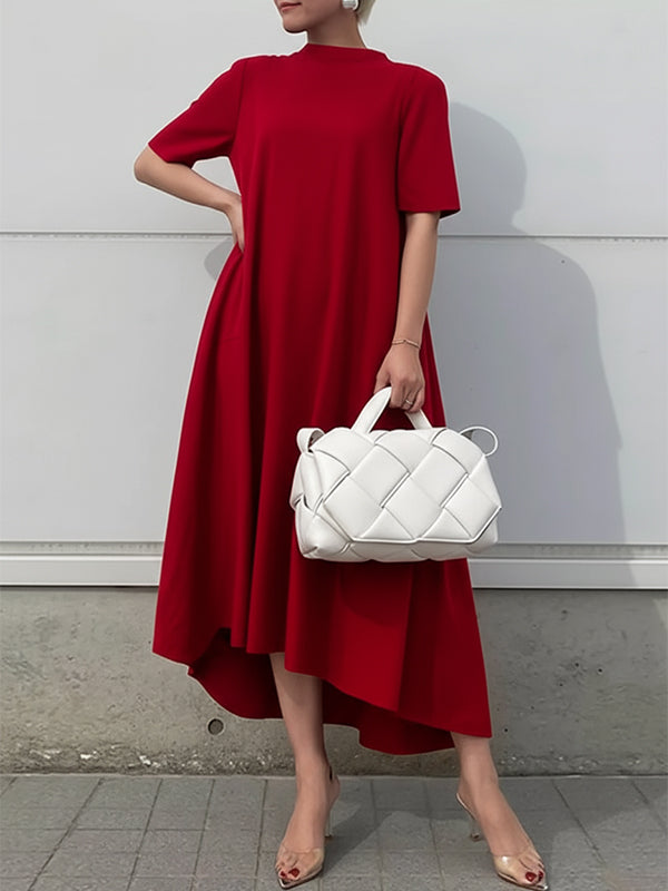 White high-low maxi dress with short sleeves by Christine Brewer, flowing solid color dress perfect for casual or formal wear.