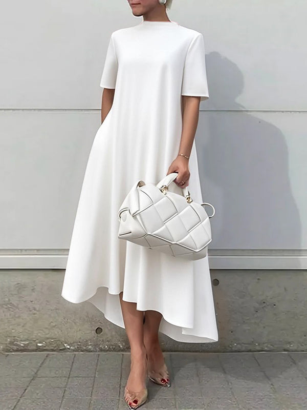 White high-low maxi dress by Christine Brewer featuring short sleeves and a solid color design.