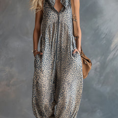 Apricot leopard print hooded chiffon jumpsuit for women, stylish and flowy pants by Christine Brewer, shown in the image.