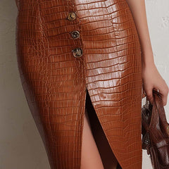 Caramel croc-embossed faux leather midi dress by Christine Brewer, featuring a stylish embossed pattern and sleek silhouette.