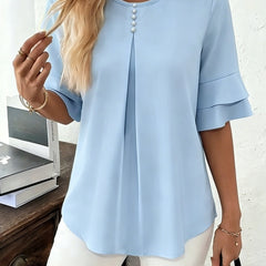 Sophia button-front women's top by Christine Brewer, featuring a stylish design and lightweight fabric, displayed on a hanger.