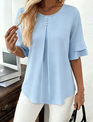 Sophia button-front women's top by Christine Brewer, featuring a stylish design and lightweight fabric, displayed on a hanger.