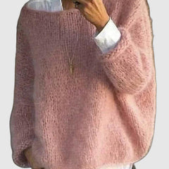 Cream-colored oversized fluffy sweater for women by Christine Brewer, featuring a cozy, plush knit texture and relaxed fit.