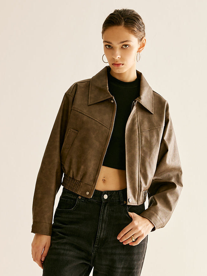 Ruby faux leather moto jacket for women by Christine Brewer, featuring a classic biker style with silver hardware and fitted silhouette.