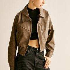 Faux leather Ruby moto jacket for women by Christine Brewer, featuring a stylish biker design and classic collar detail.