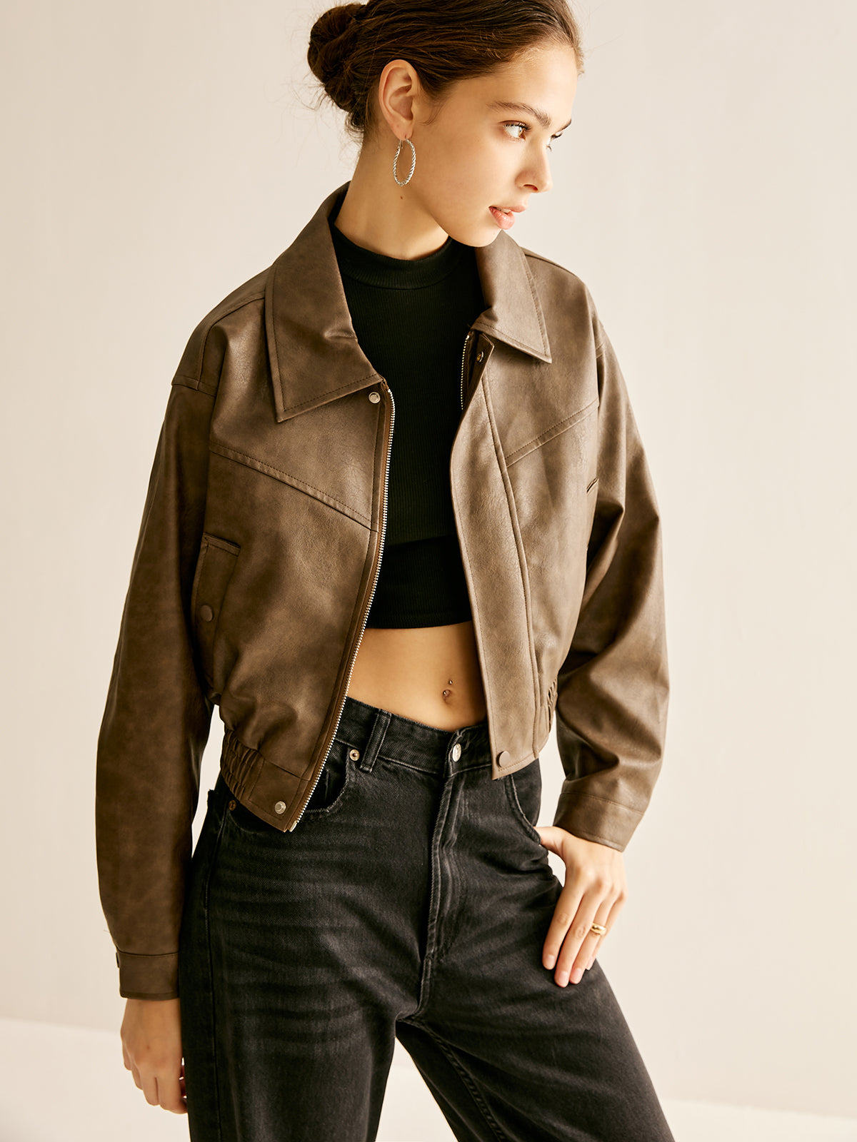 Faux leather Ruby moto jacket for women by Christine Brewer, featuring a stylish biker design and classic collar detail.