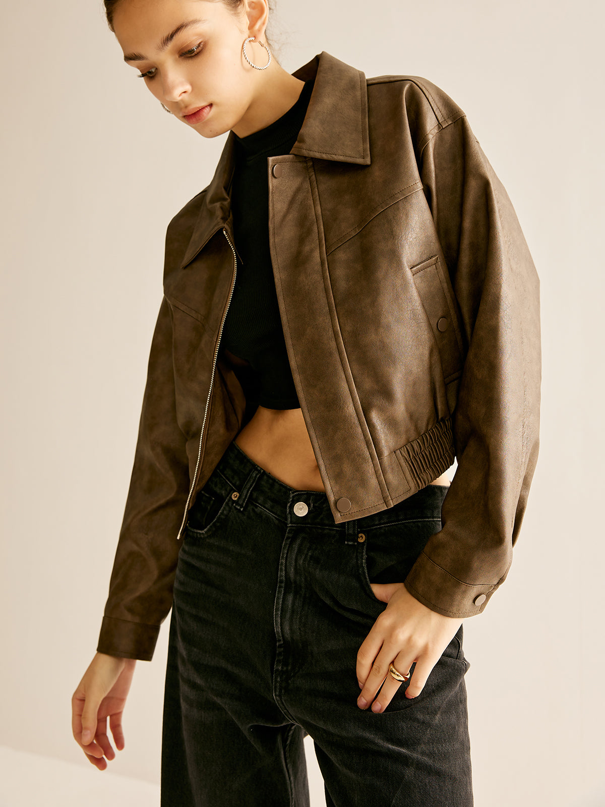 Ruby faux leather moto jacket for women by Christine Brewer, featuring a classic biker style with silver hardware.