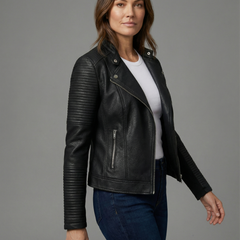 Black Nora faux leather jacket for women by Christine Brewer, tailored with a sleek, modern design and stylish fit.