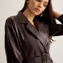 Zoe belted faux leather jacket for women by Christine Brewer, shown in a sleek fit with front belt and classic jacket details.
