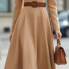 Elegant camel turtleneck belted midi dress by Christine Brewer, featuring a fitted silhouette and stylish design.
