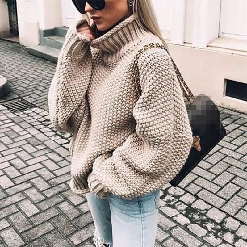 Chunky knit turtleneck oversized sweater for women by Christine Brewer, featuring a cozy, stylish design in neutral tones.