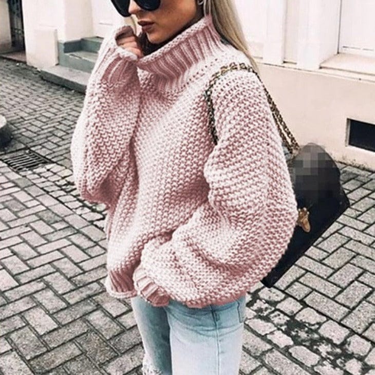 Chunky knit turtleneck sweater for women by Christine Brewer, featuring an oversized fit and cozy design.