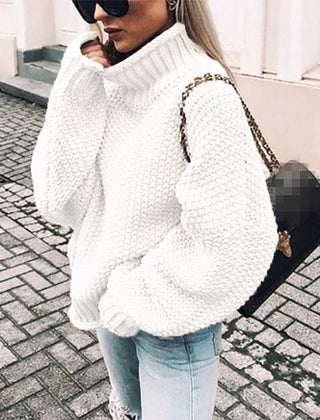 Chunky knit turtleneck sweater for women by Christine Brewer, featuring an oversized fit and cozy design.