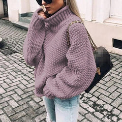 Hazel oversized chunky knit sweater with turtleneck in cozy, versatile style by Christine Brewer, featuring thick knit texture.