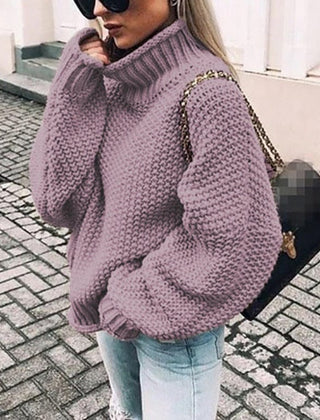 Hazel oversized chunky knit sweater with turtleneck in cozy, versatile style by Christine Brewer, featuring thick knit texture.