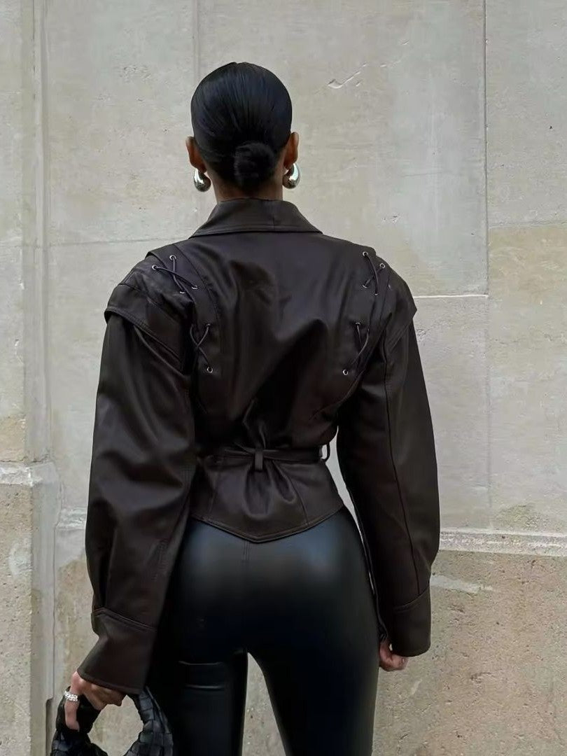 Tailored faux leather blazer for women by Christine Brewer, featuring a sleek, fitted design and classic collar.