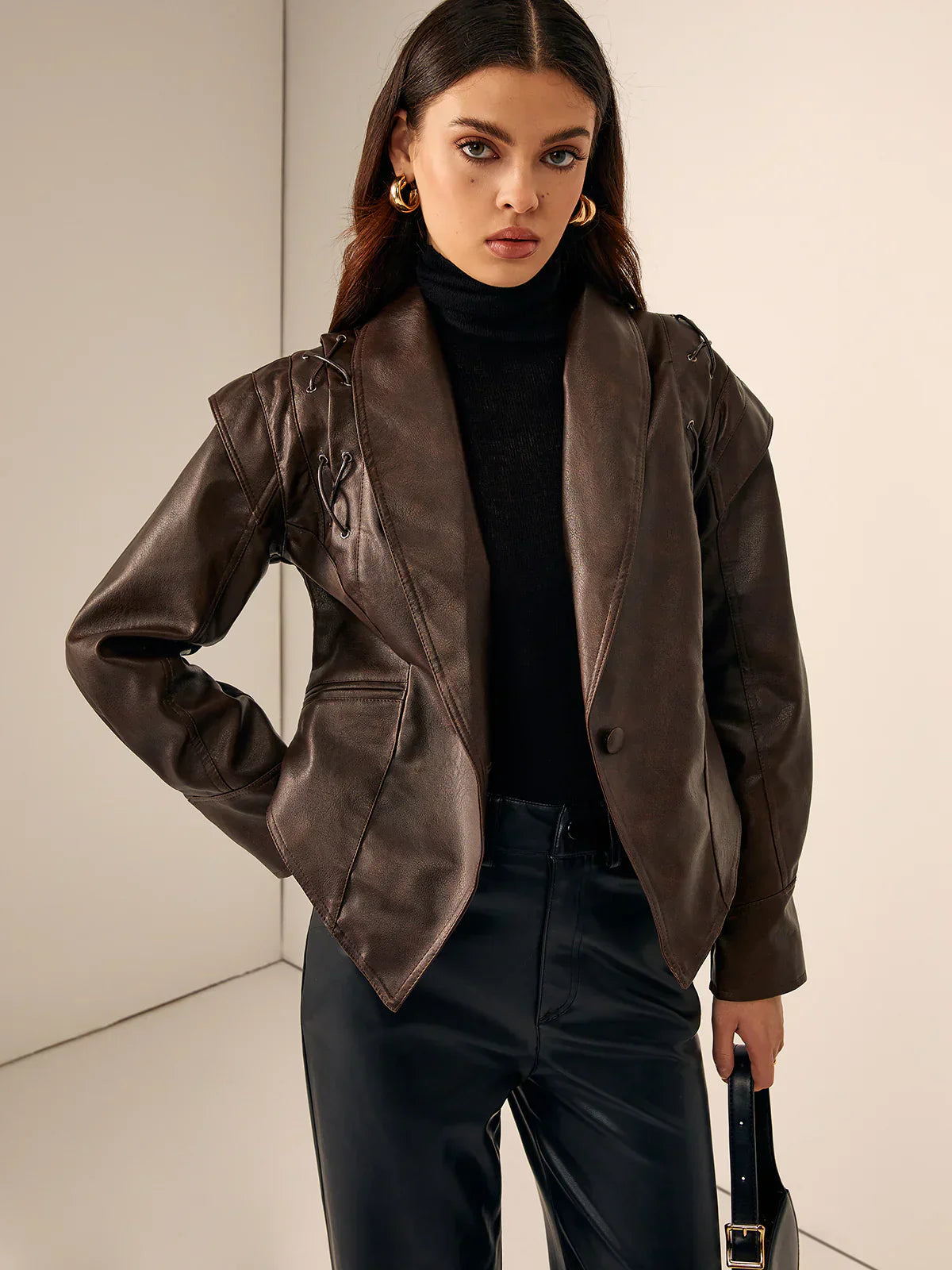 Brown faux leather blazer for women by Christine Brewer, tailored jacket with classic lapels and sleek fit.