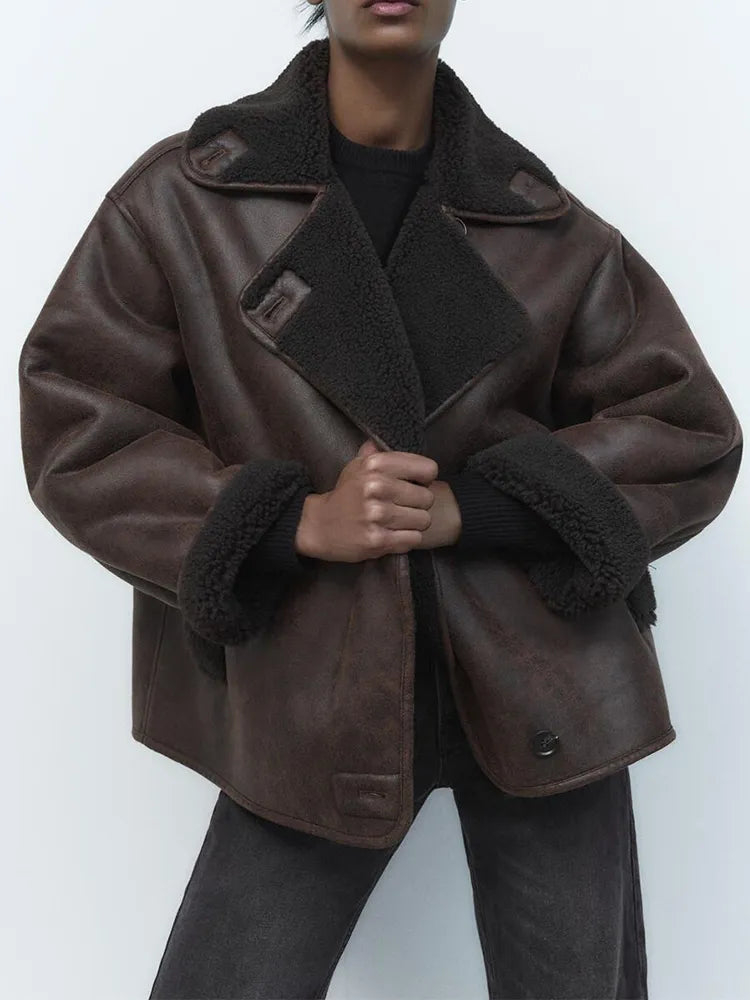 Brown faux leather jacket for women by Christine Brewer, featuring a sleek, draped design and stylish fit.