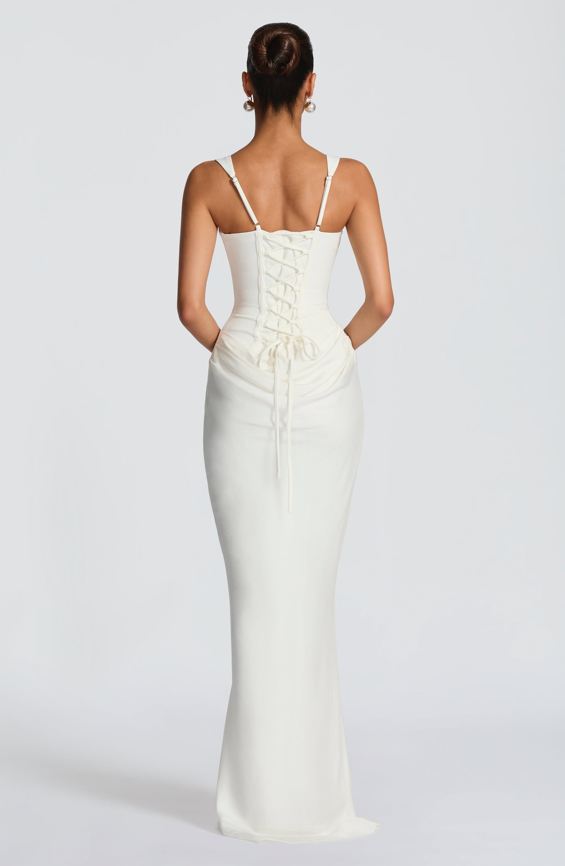 Ivory summer maxi dress for women with square neckline and bodycon fit by Christine Brewer, shown on a model.