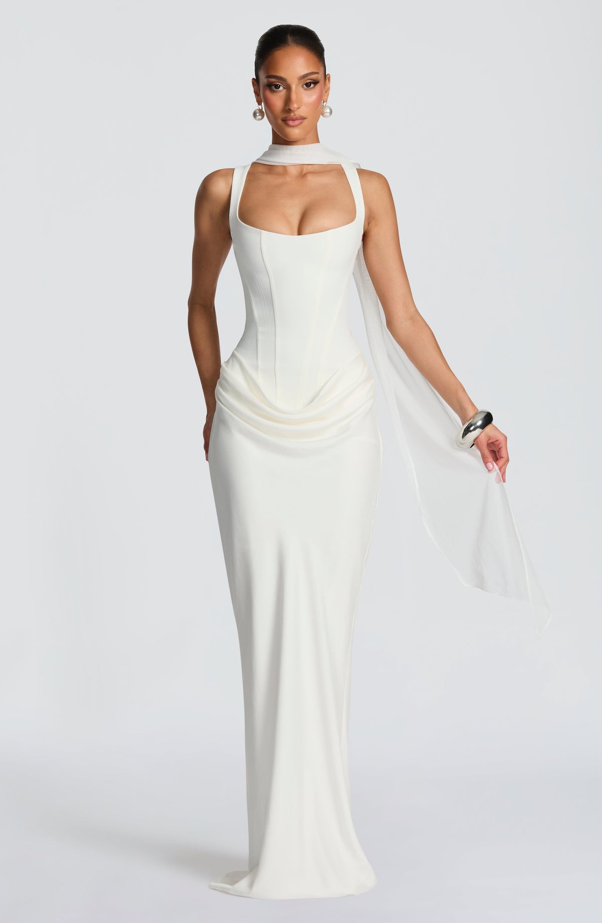 Ivory summer maxi dress for women with square neckline and bodycon fit, by Christine Brewer, shown on a model.