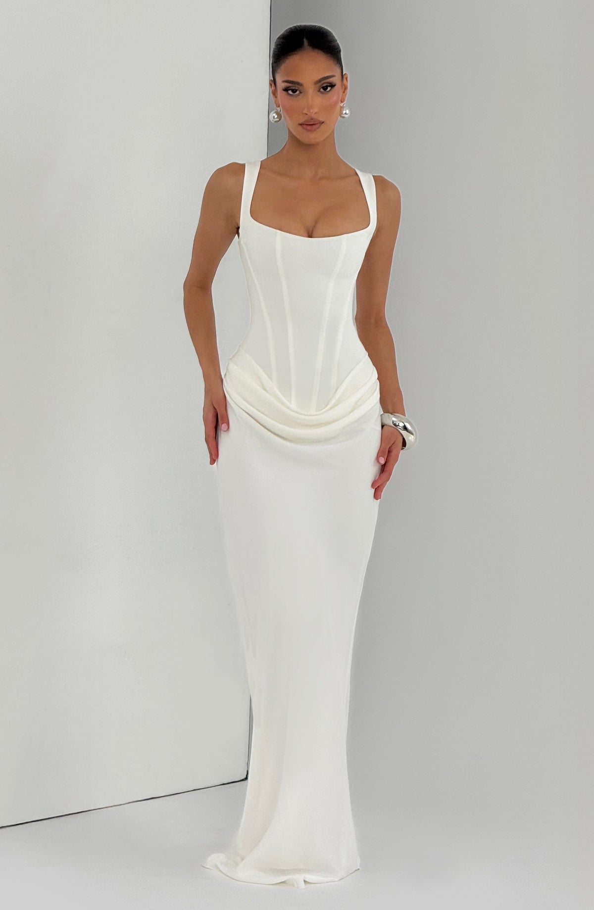 Ivory summer maxi dress for women with square neckline and bodycon fit by Christine Brewer, shown on a model.