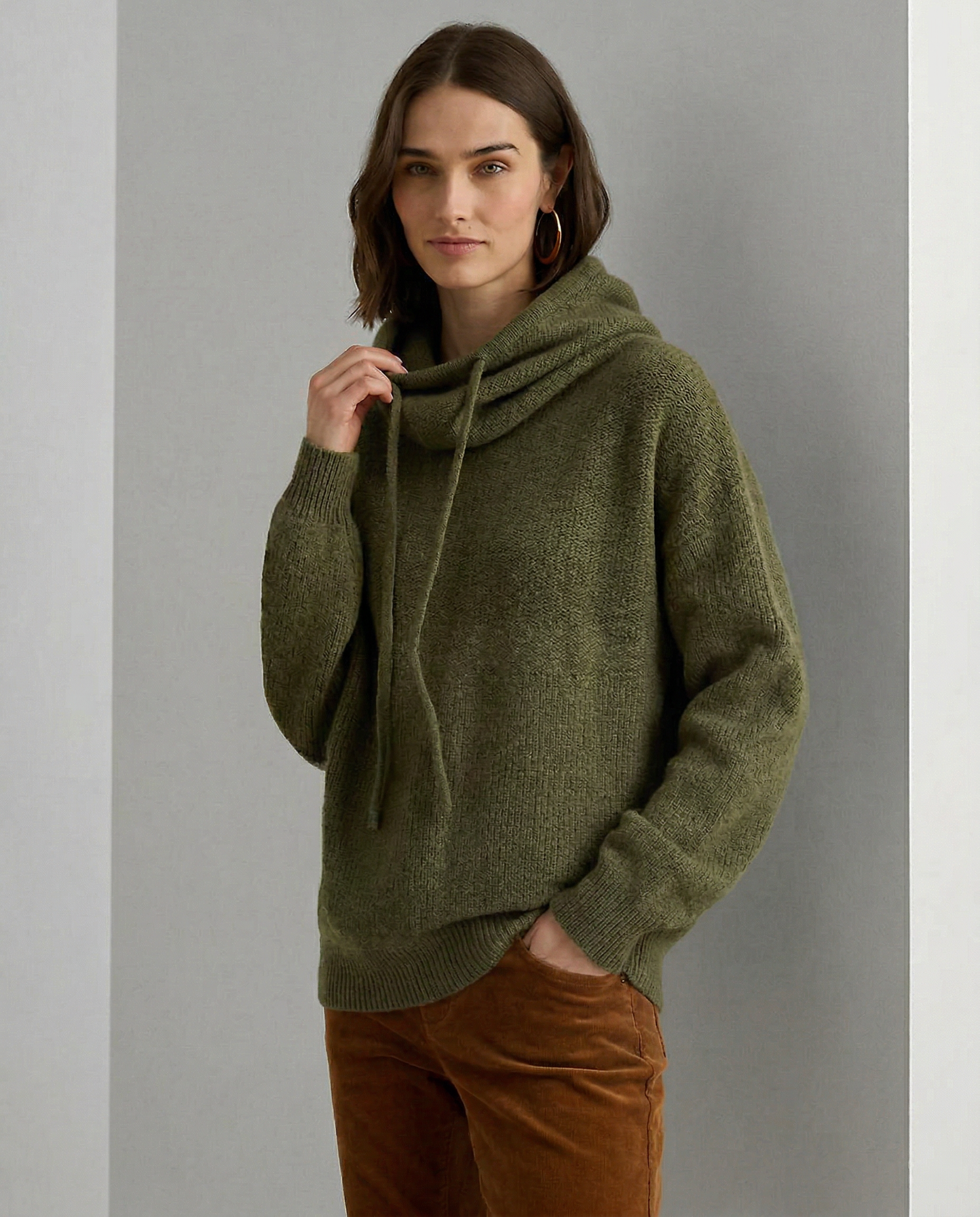 Fern ribbed hoodie for women by Christine Brewer, featuring a cozy fit and textured fabric in green.
