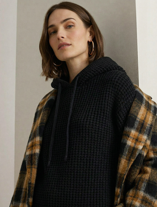 Women's ribbed hoodie from Christine Brewer featuring a fern print, comfortable fit, and casual style.