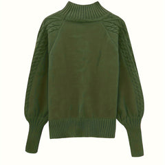Mila cable knit high neck sweater for women by Christine Brewer, featuring a cozy high collar and textured knit pattern.