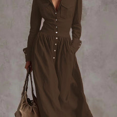 Christine Brewer high-waisted long sleeve maxi dress with pleated pockets, split-joint lapel, and solid color in a stylish, elegant design.