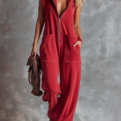 Raspberry red cotton hooded zip-front jumpsuit for women, featuring a relaxed fit and casual style by Christine Brewer.