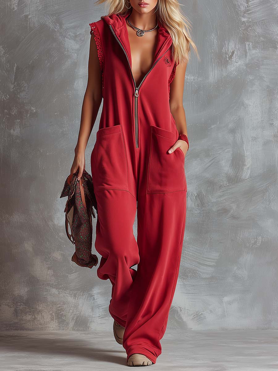 Raspberry red cotton hooded zip-front jumpsuit for women, featuring a relaxed fit and casual style by Christine Brewer.