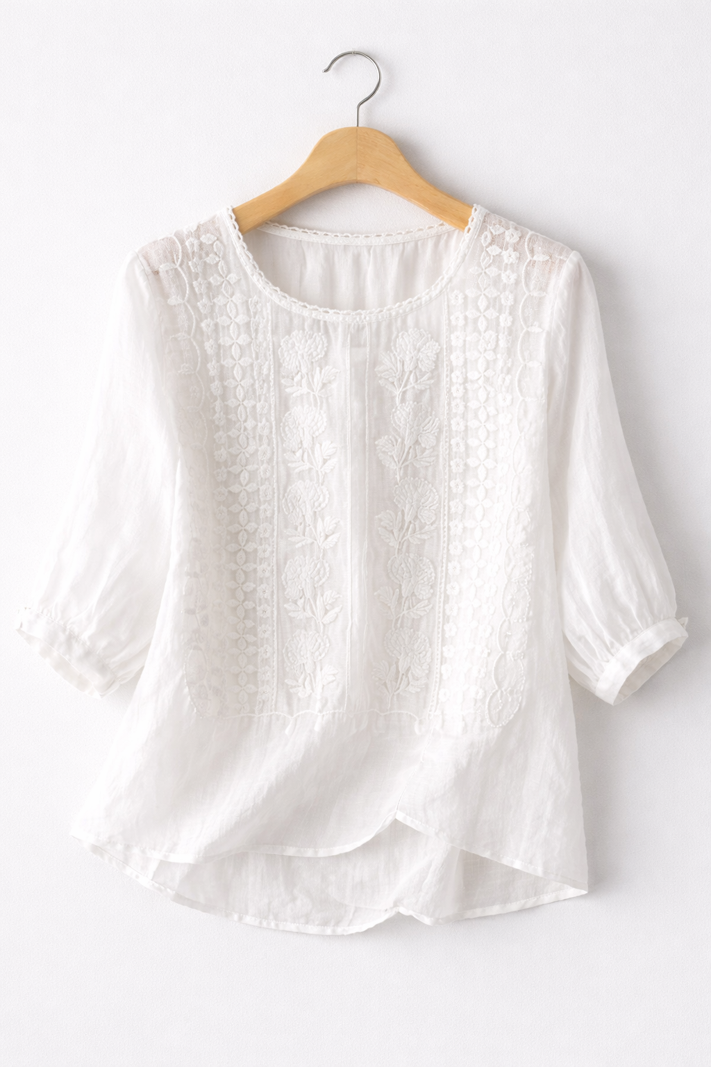 White floral blouse for women from Christine Brewer's Isla collection, featuring lightweight fabric and feminine design details.