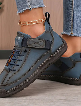 Dark blue Christine Brewer Meya orthopedic sneakers with supportive walking shoes design, featuring cushioned soles and breathable material.