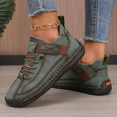Dark green orthopedic sneakers by Christine Brewer, Meya walking shoes with supportive design and comfortable fit.