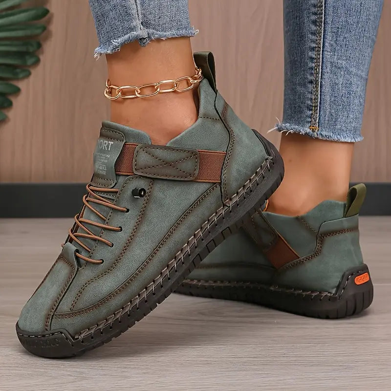Dark green orthopedic sneakers by Christine Brewer, Meya walking shoes with supportive design and comfortable fit.