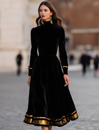Elegant velvet midi dress by Christine Brewer featuring gold trim, showcasing a stylish and sophisticated evening wear look.